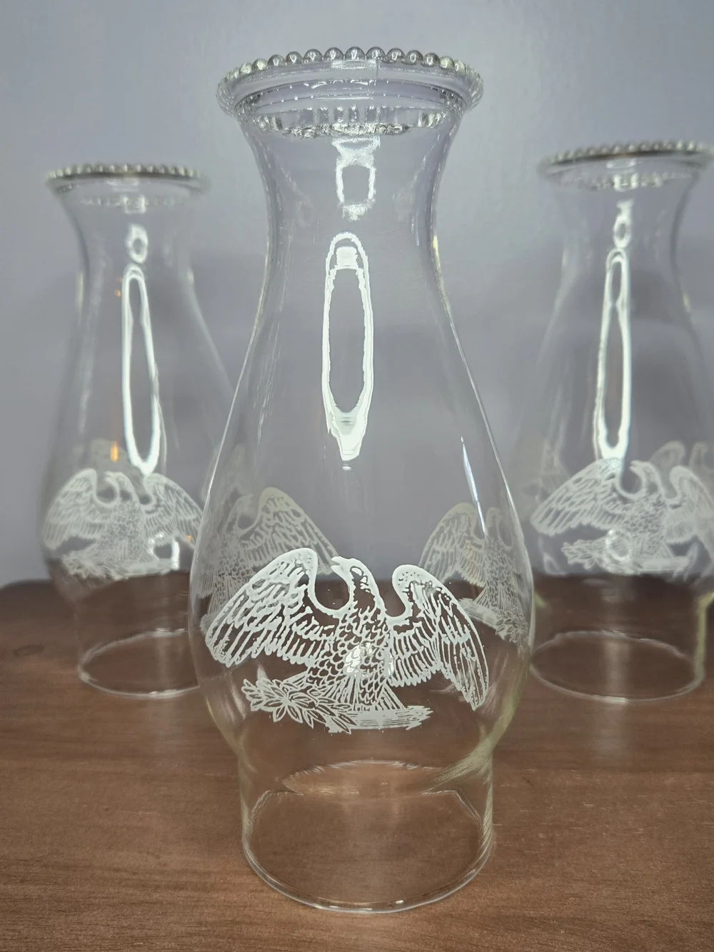 Clear Glass Hurricane Vase with White Etched Eagle Motif Set Of 3
